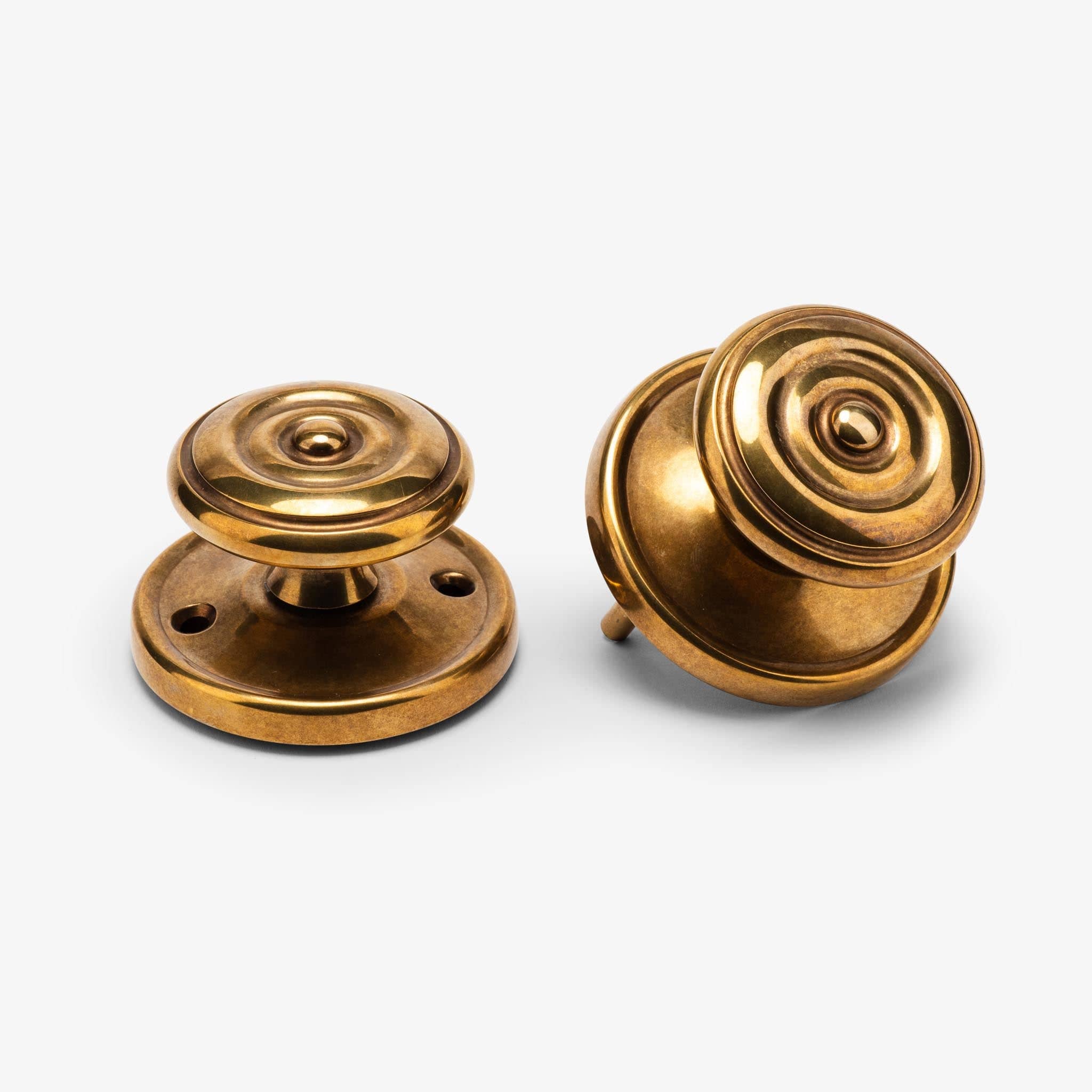 Valencia Rosette Passage Door Knob Set - Burnished Brass