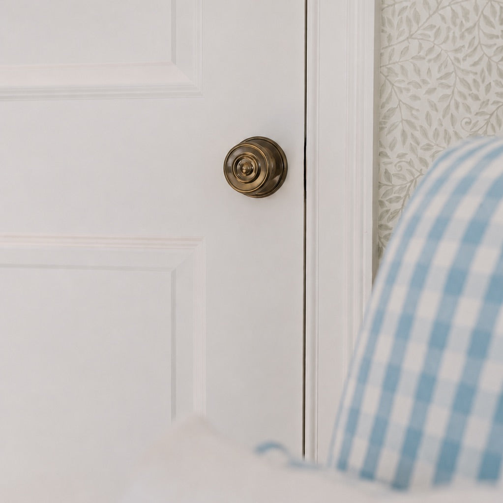 Valencia Rosette Passage Door Knob Set - Burnished Brass