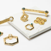 Elaborate Pulls, Knobs and Backplates in Polished Brass with Gemstones