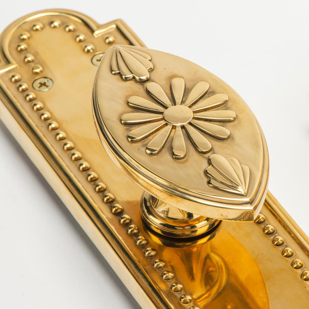 Rosalie Vertical Passage Door Knob Set in Unlacquered Brass