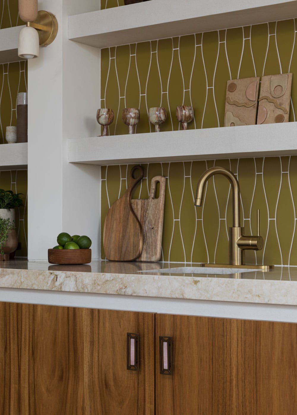Q: I love how you used color and shape in these spaces. Do you have any rules for mixing these and coordinating them with hardware?