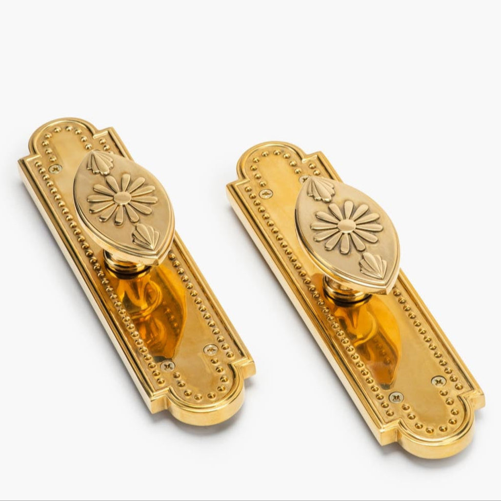 Rosalie Vertical Passage Door Knob Set in Unlacquered Brass