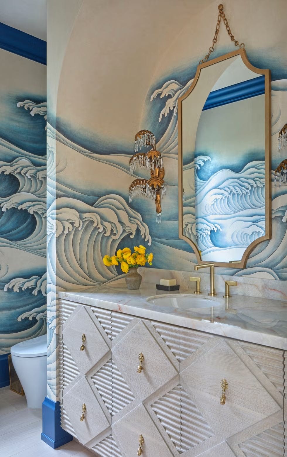 Cabinet hardware: Mayan Drop Pull. Sconce: Paul Ferrante. Mirror: Bradley. Vanity: custom, Ruffino Cabinetry . Fixtures: Newport Brass.