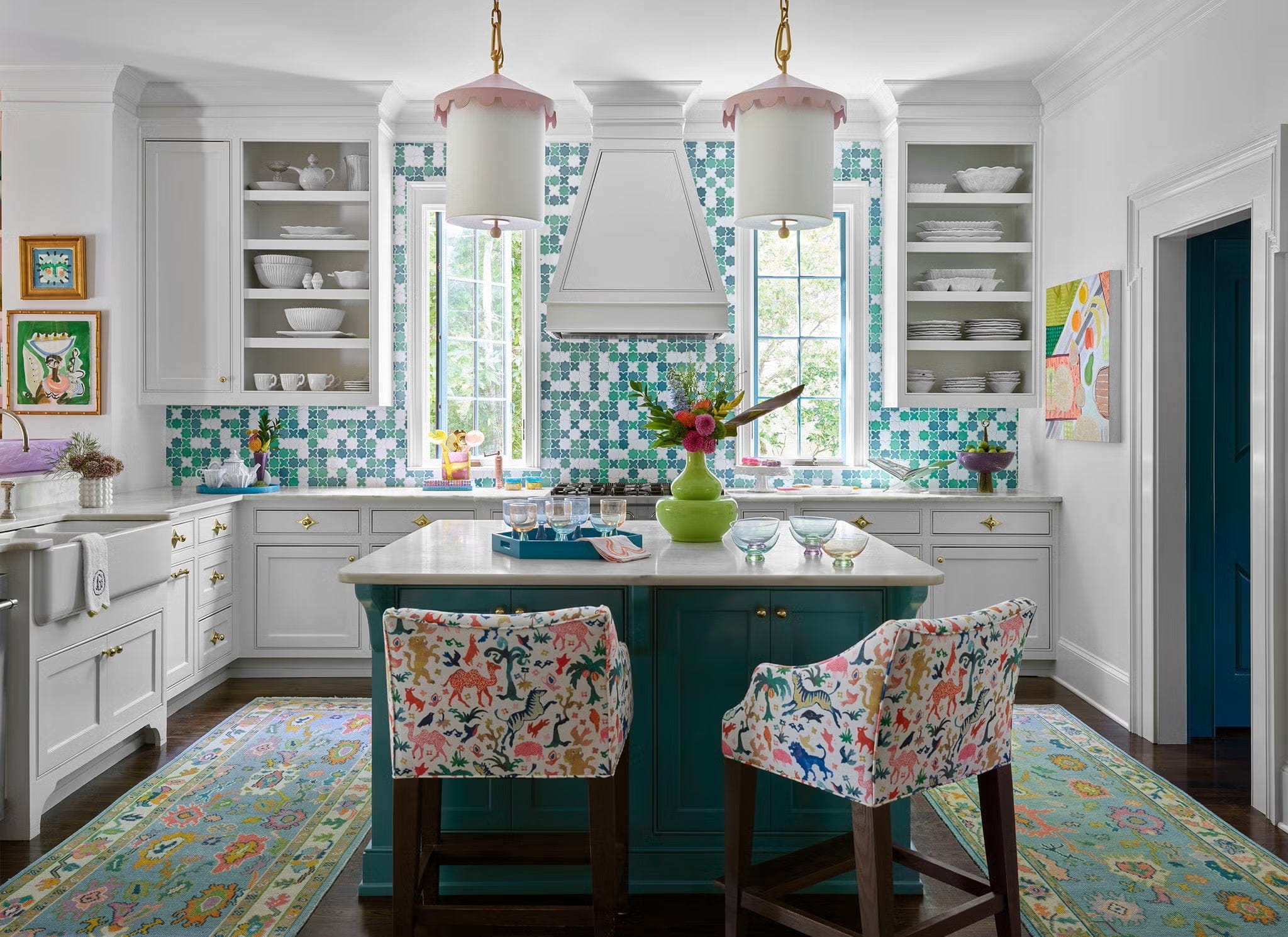 Hardware: Cosmos Knob , Asteroid Backplate, Stools: Lee Industries , in Schumacher fabric. Pendants: The Urban Electric Co. Backsplash: custom, Renaissance Tile & Bath . Paint: Decorator’s White, Benjamin Moore .