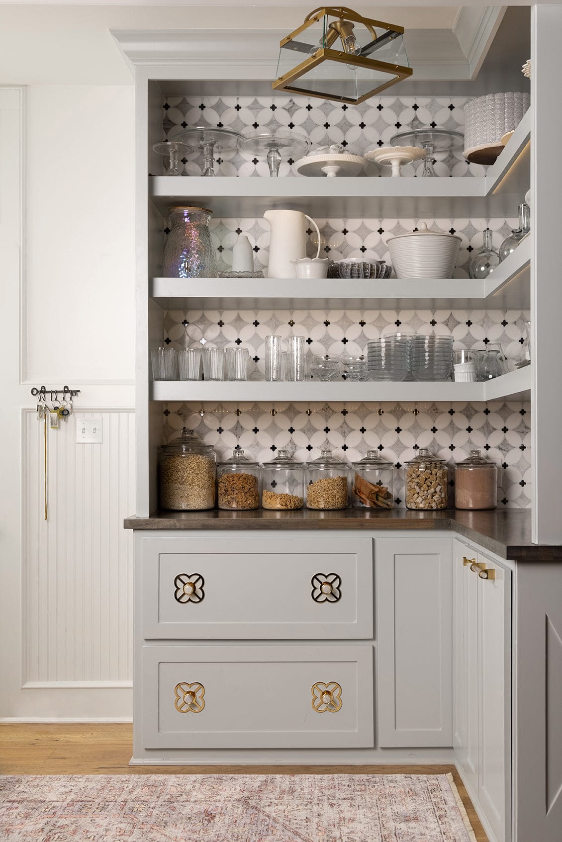 HGTV star Tamara Day pairs the Jones Backplate in Brass with the Lane Custom Knob in Brass and Moonstone